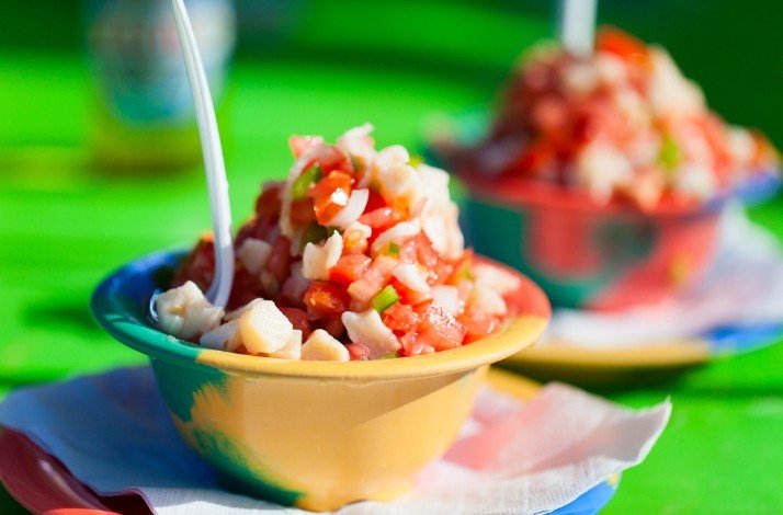 Fresh conch salad spiked with crisp veggies and citrus juices served for participants of the tour to Caves of Nassau.