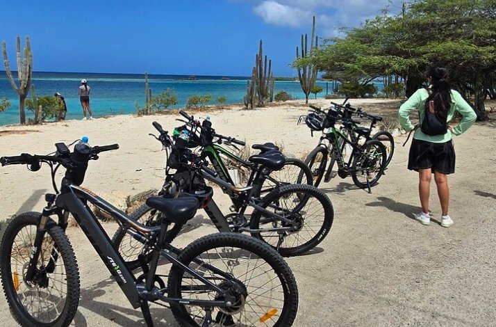 The bycicles are parket by the Eagle Beach at Oranjestad, Aruba.