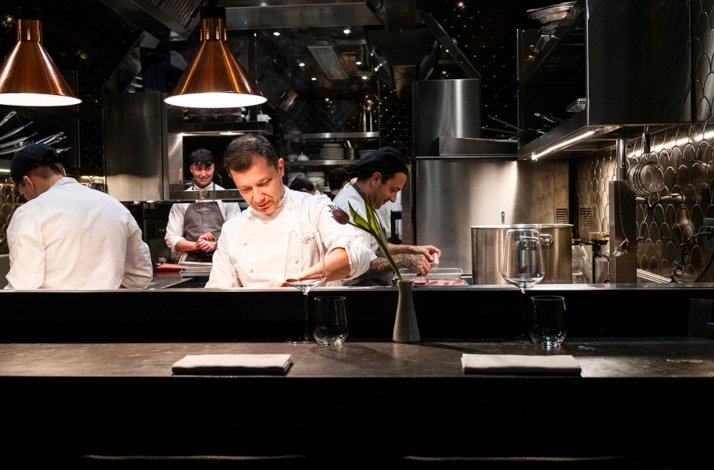 Chef Giulio Terrinoni at work in the kitchen of Michelin-starred restaurant Per Me.