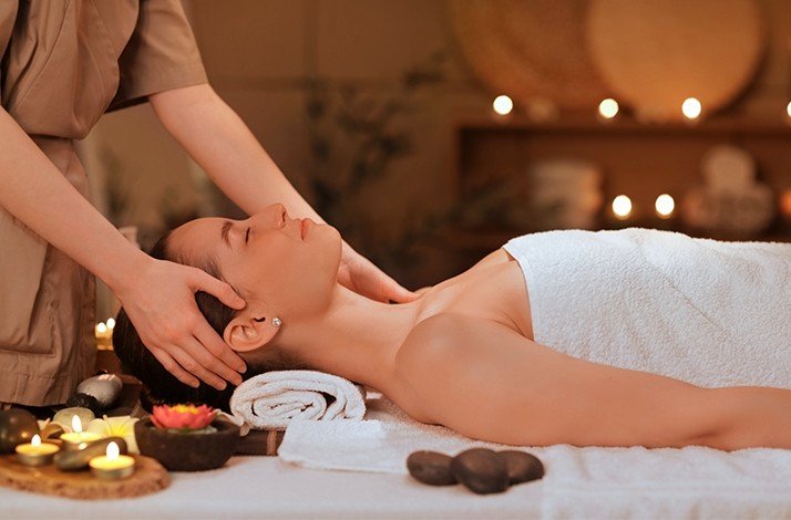The lady is having a deeply relaxing massage at the Half Moon's award-winning Fern Tree Spa.