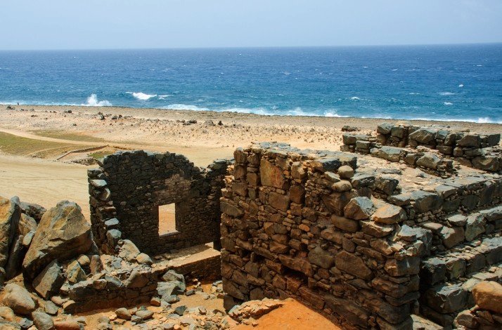 The Bushiribana Gold Mill Ruins with the sea in the background.