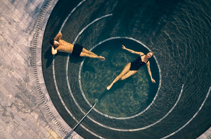 People relaxing at Alba Thermal Springs & Spa