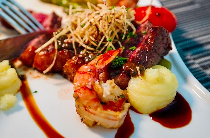 A close up photo at a dish made from shrimps, meat and vegetables served at Saint Tropez Ocean Club in Willemstad.