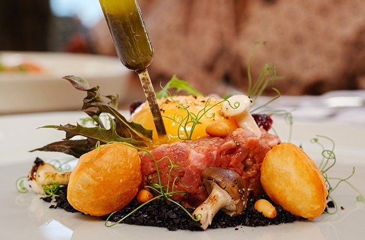 A full meal made of local ingredients served at restaurant of Beach Resort