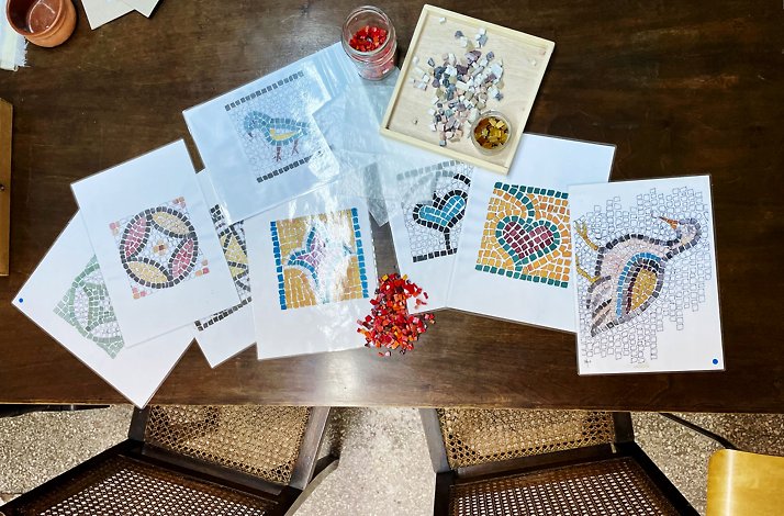 Mosaic paintings on white papers.