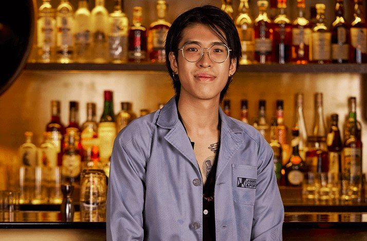 Jarryl Goh behind the cocktail bar at Firefly bar