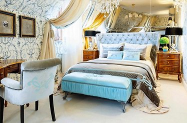 A view of the room interior featuring comfortable double bed at the SUTER PALACE Heritage Boutique Hotel Bucharest, Romania. 
