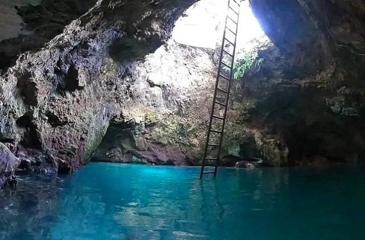 A ladder leading out of the Blue Hole swimming cave, Jamaica.