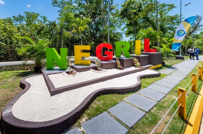 A photo of Negril letters outside.