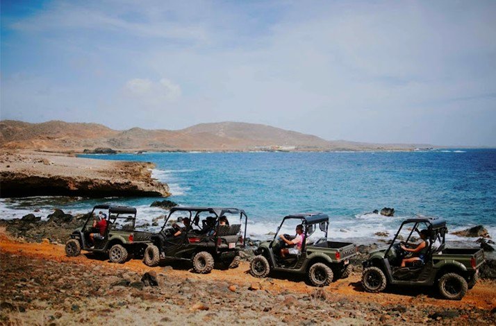 UTV tour across Aruba's rugged landscape with an expert local guide.