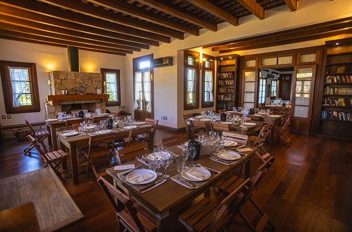 The interior of  Viñedos y Olivares del Quintón with the tables set for the tastings
