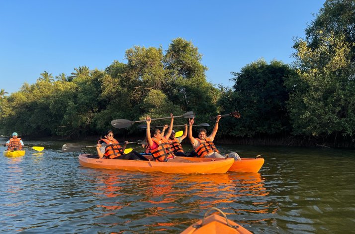 A group of person kayaking at River Chapora