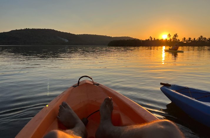 A person on a boat at river Chaporá, close to private Sai Island