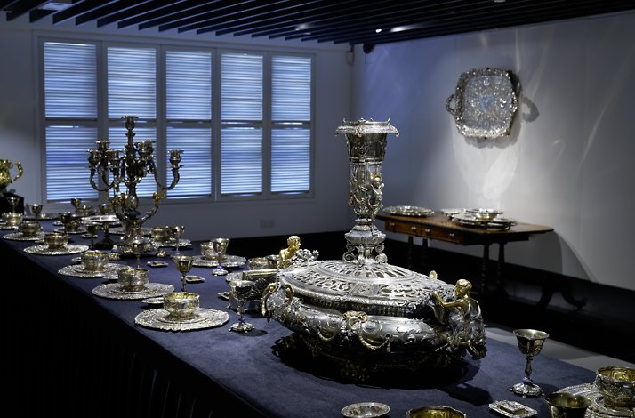Exhibited silver table set from Chinese treasures on an after-hours museum tour.