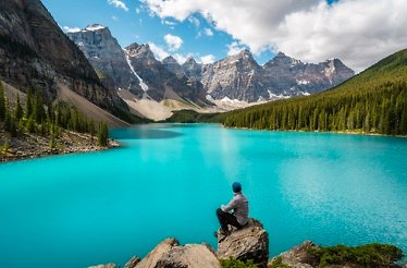 Hiker at Moraine lake in Bannf National park.