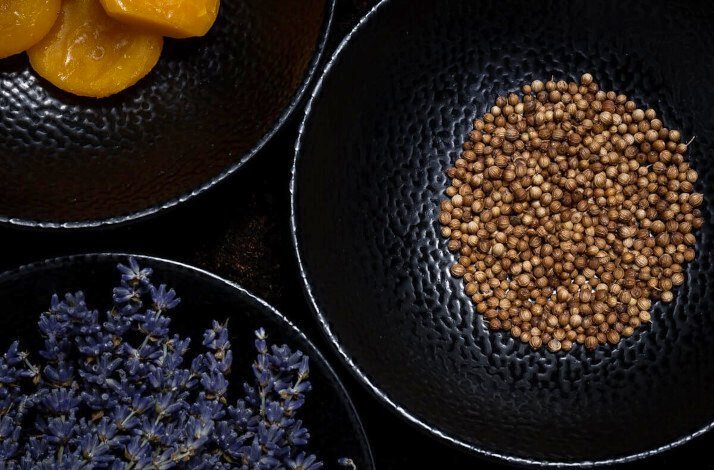 A shot from the above of the ingredients place in black bowls.