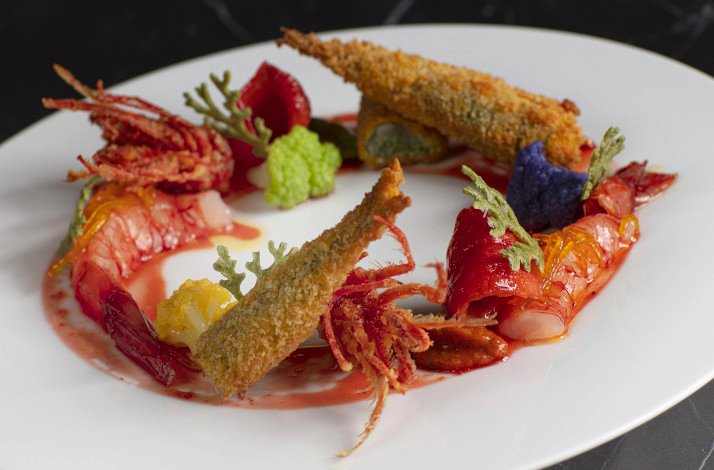 A freshly prepared dish served at Atelier, Michelin-starred restaurant in Piedmont's Italian Alps