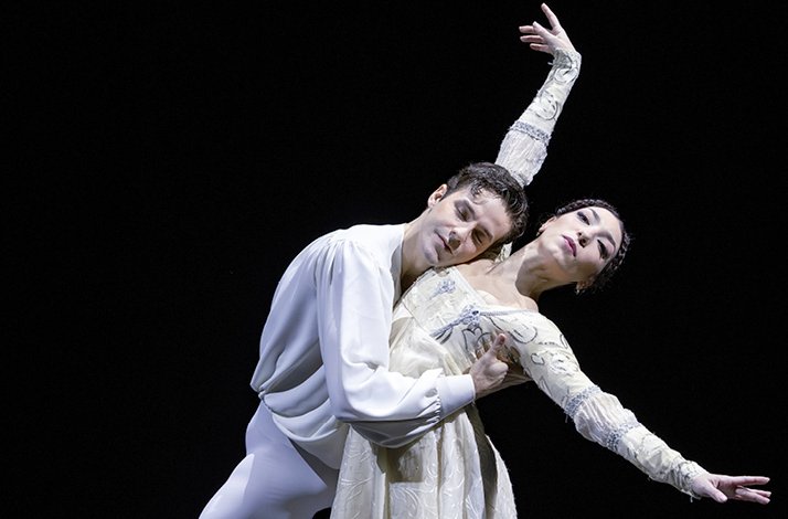 Two dancers performing in the Romeo and Juliet ballet.