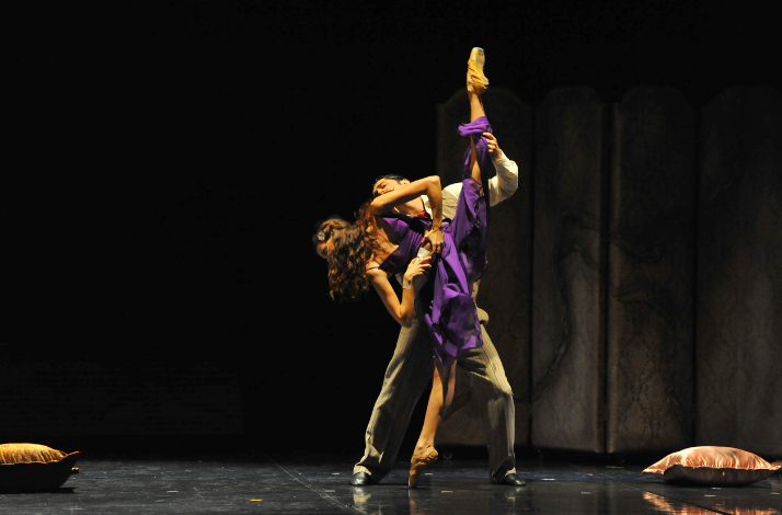 Two ballet dancers performing on stage