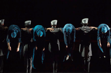 Ballet dancers performing together on stage