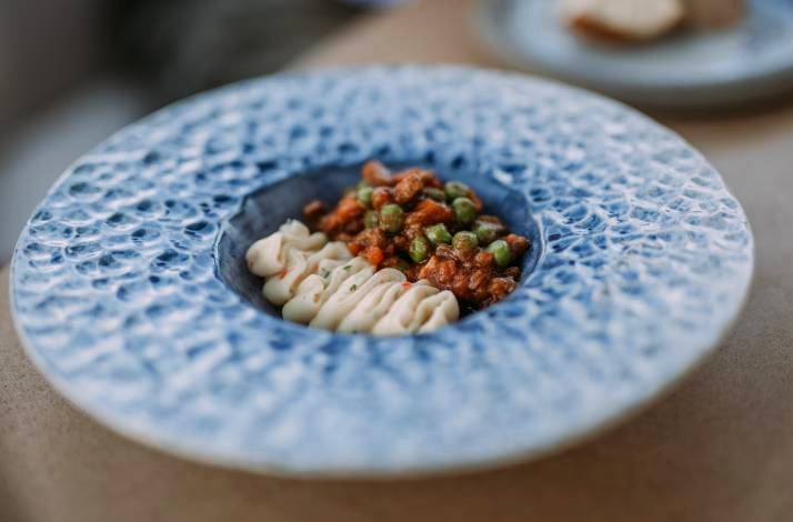 A close shot of the dish in the blue plate.