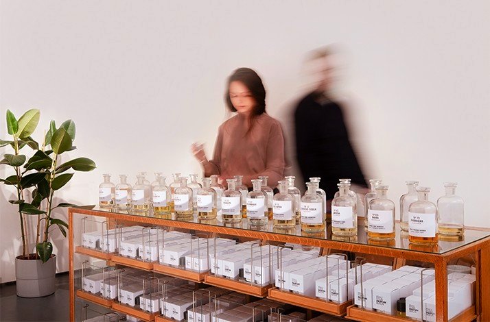 A person select the ingredients for their signature scent during a master class at Frau Tonis Parfum