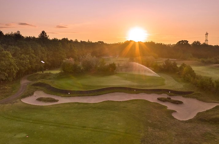 Bird's eye view of a golf course next to The Duke.