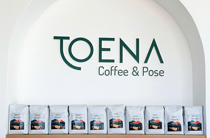 Toena Coffee & Pose logo on the wall.