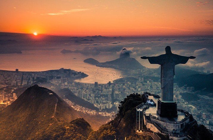 Dawn view of the Christ the Redeemer is an Art Deco statue of Jesus in Rio de Janeiro, Brazil.