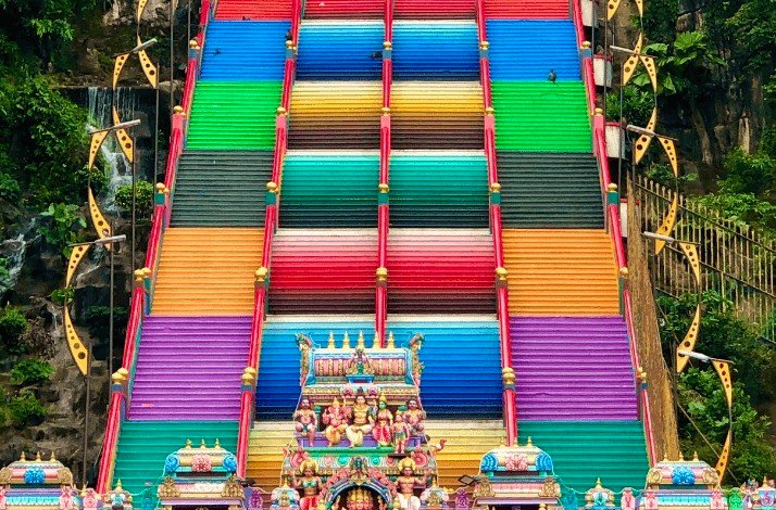 Vibrant and colorful stairway to Batu Caves, a UNESCO World Heritage Site