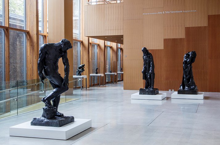 Black statues in the Art Gallery of Ontario.