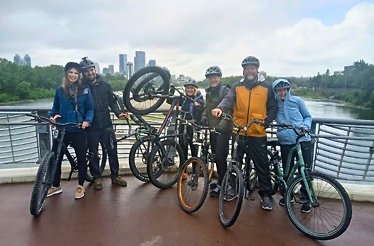 A group of persons on a biking tour at Calgary city 