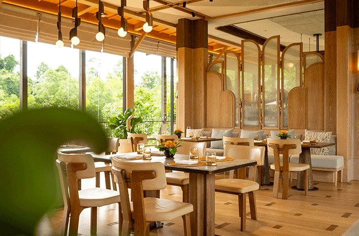 Sofas and stained glass windows at Jampa Restaurant.