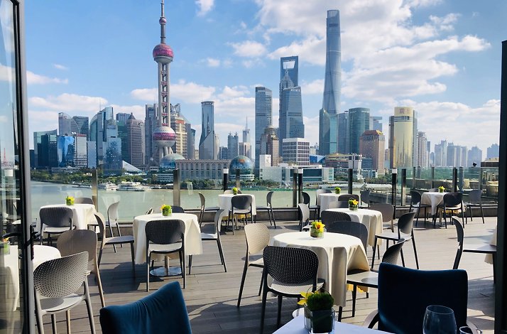 Access the prestigious Roosevelt Club Floor for a luxe dining experience: In Shanghai, Mainland China The House of Roosevelt open terrace on a sunny day, Shanghai, China.