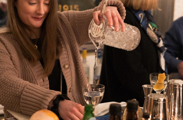 A person mixing a cocktail during a masterclass at Dante