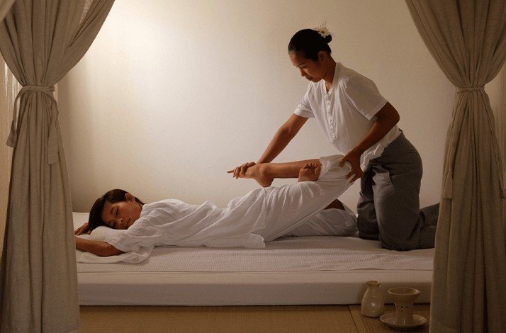 Girl enjoys Thai Massage in Como Shambhala Metropolitan Bangkok.