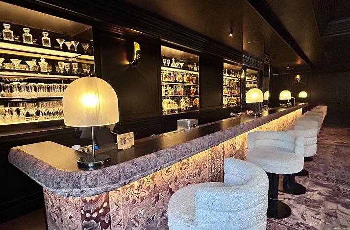 Luxurious interior of the bar at Kimpton Qiantan Hotel.