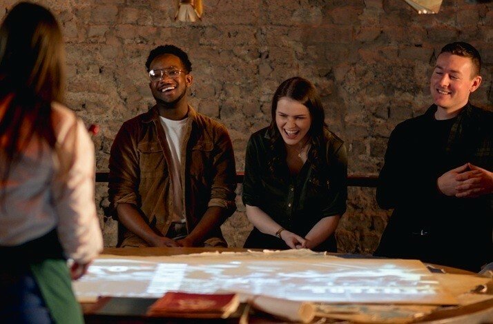 A group of people in a cocktail masterclass at Bow Street Distillery