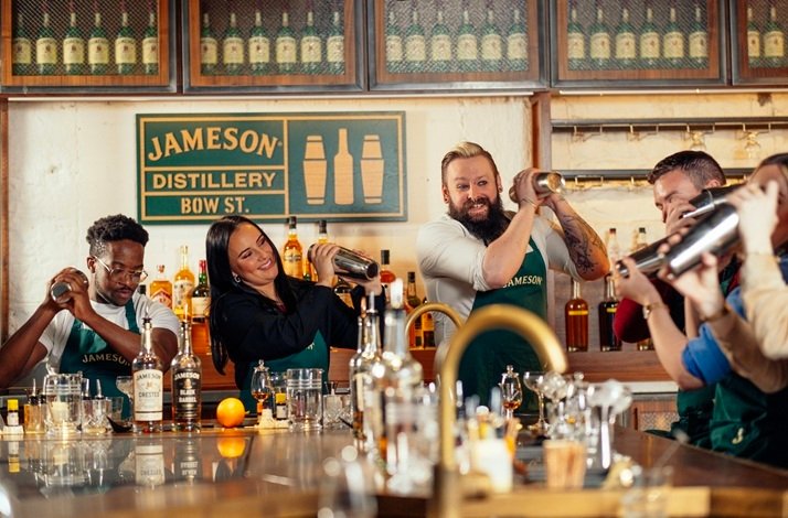 Group of people making craft cocktails at Jameson Distillery