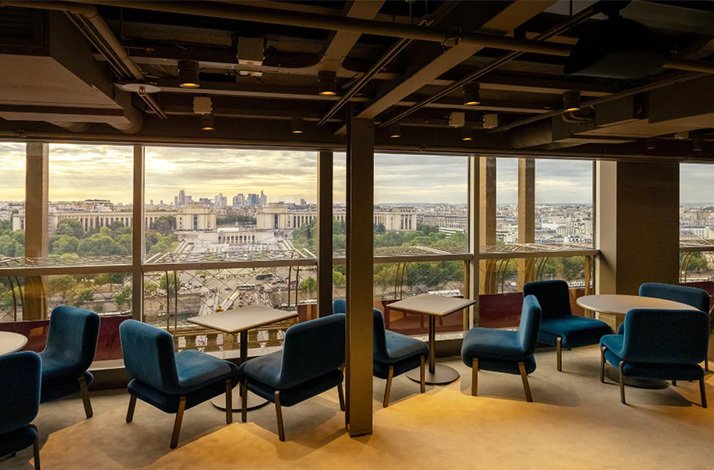 Window seats with superior city views at Madame Brasserie restaurant.