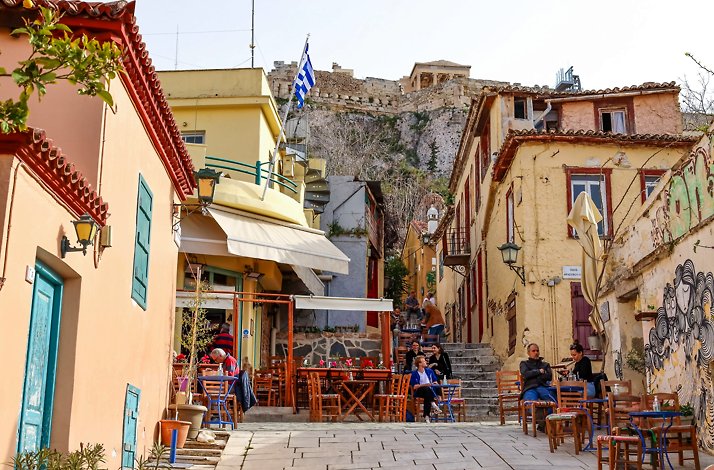 A narrow street with a small cafe in Plaka, Athens.