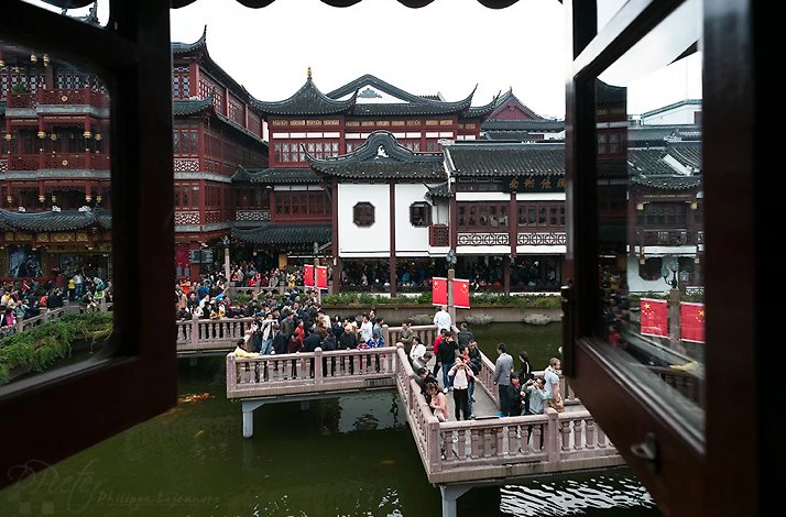 visitors strolling in City God Temple in Shanghai.