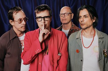 Promotional banner for WEEZER: The Gathering, displaying the band members.