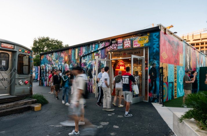 The entrance of Wynwood Walls Art Bar busy with guests