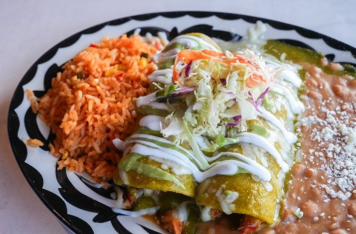 Mexican dish with rice and chopped vegetables.
