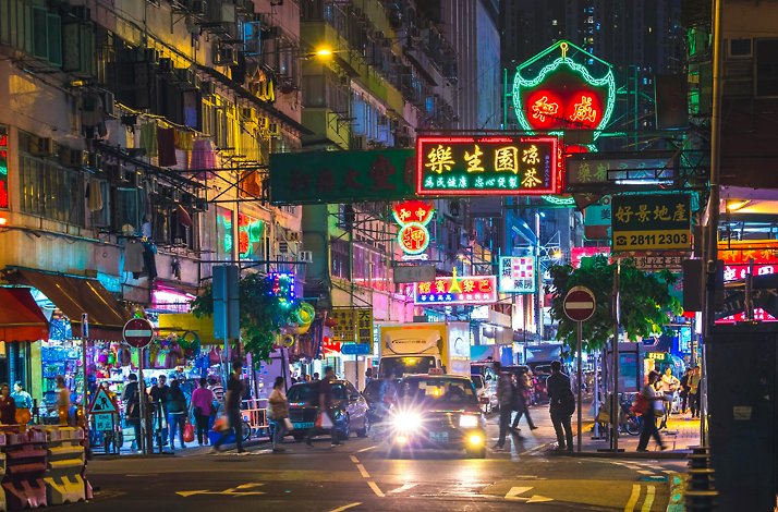 Beautiful neon signs on streets of Hong Kong at night.