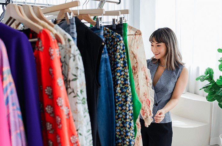 Sera Murphy browses through a collection of clothes at The Reoutfitter