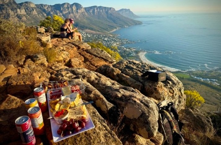 This scenic viewpoint overlooking the coastline is frequently identified as part of the Table Mountain National Park. 