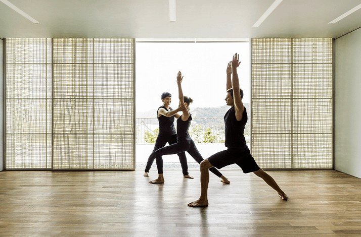 People practising Yoga at Como Point Yamu.