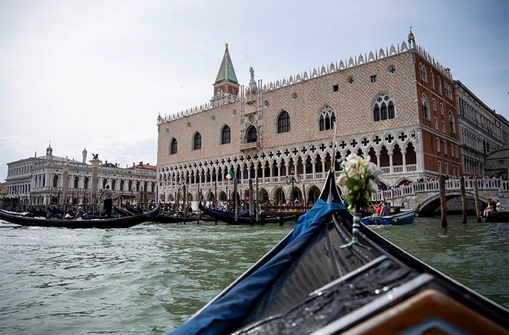 View from a gondola on the Doge`s Palace in Venice.